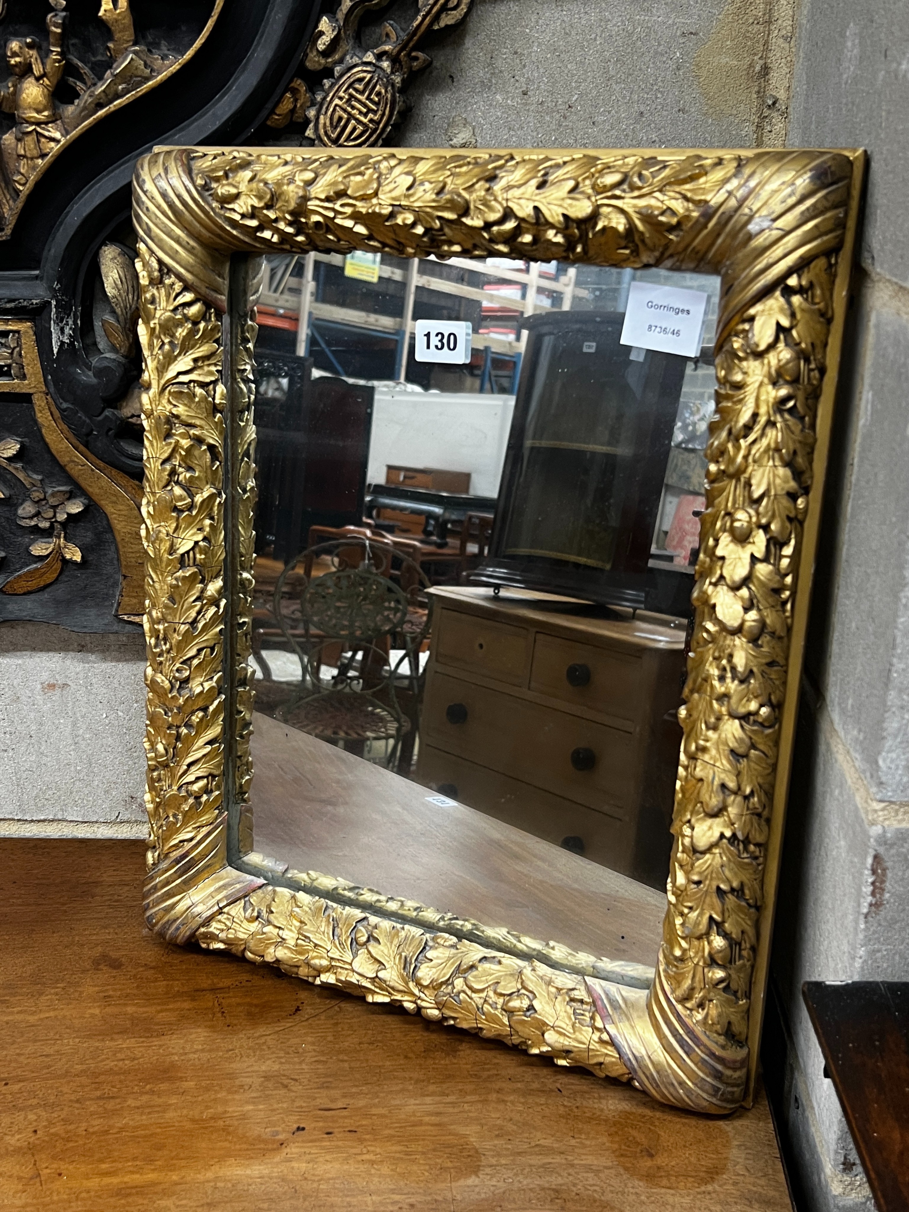 A Victorian rectangular carved giltwood mirror, width 41cm, height 52cm